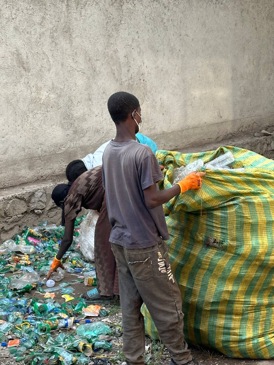 Worker handling recyclables